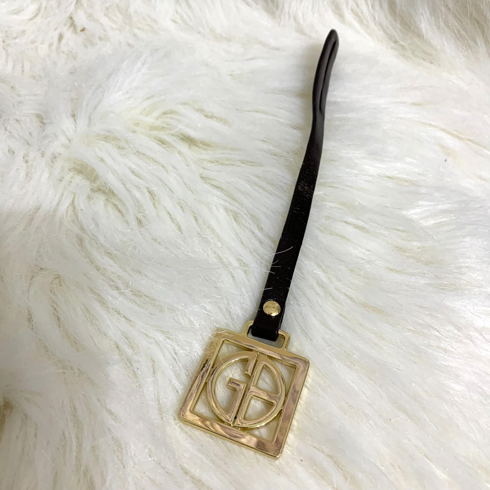 GIANI BERNINI Gold Metal Signature Purse Charm Hang Tag w/Brown Leather Strip
